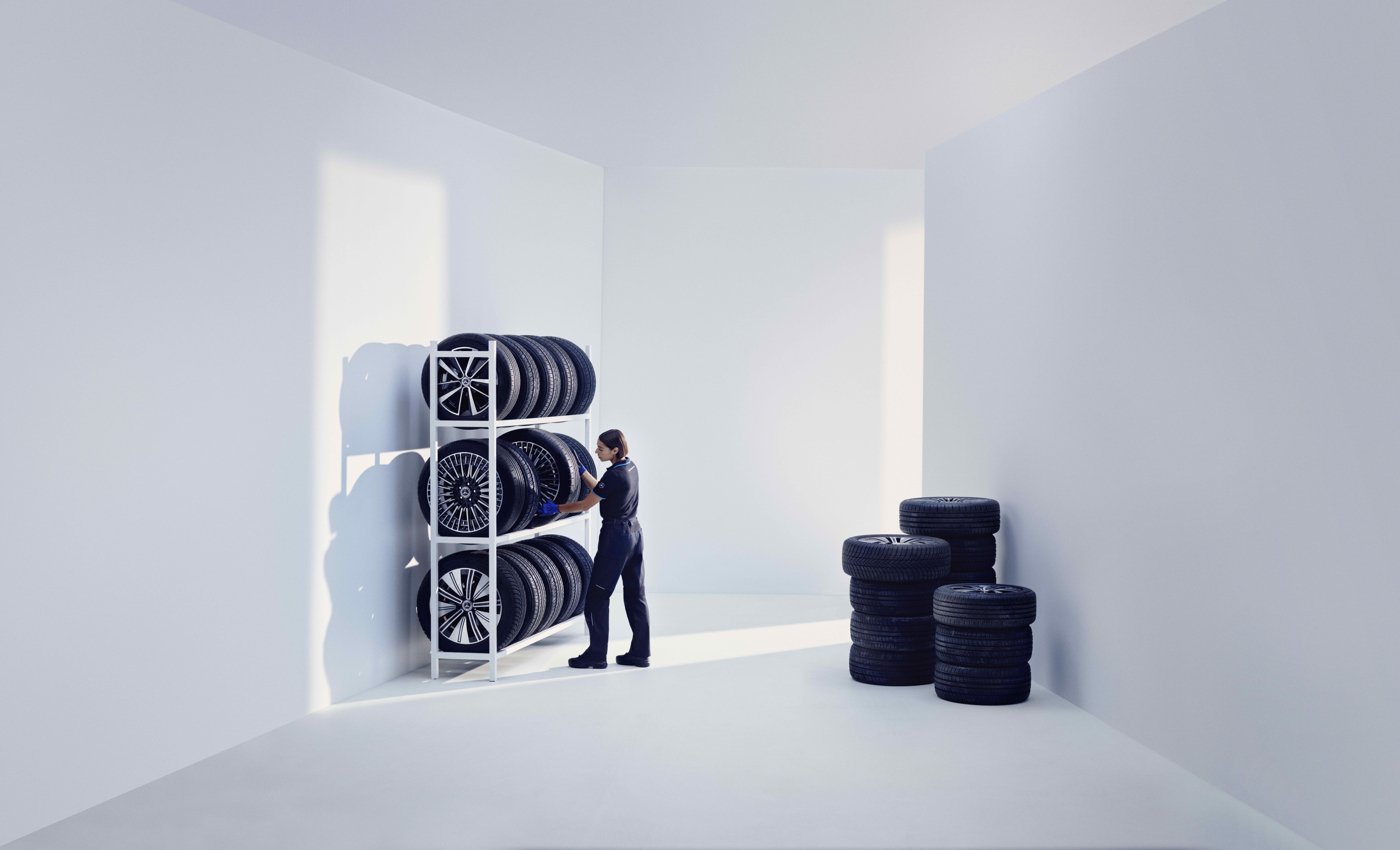 Original Tires | Mercedes-Benz A Mercedes-Benz technician stores Mercedes-Benz Original tires on a shelf.