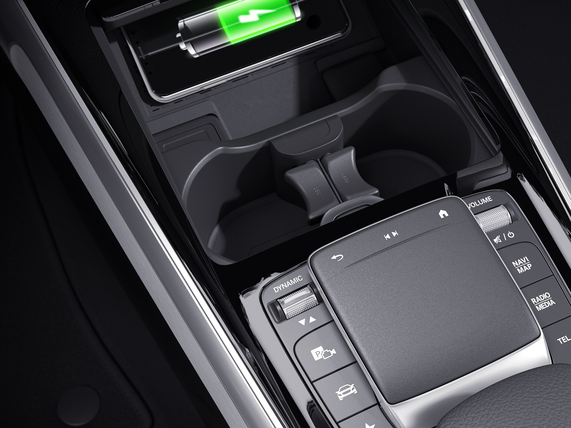 The wireless charging surface in the oddments tray at the front of the centre console of the EQB from Mercedes-EQ.