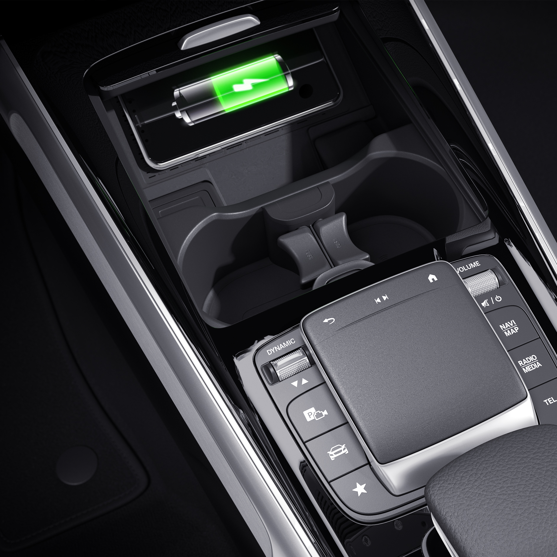 Wireless charging system | EQB | Mercedes-EQ The wireless charging surface in the oddments tray at the front of the centre console of the EQB from Mercedes-EQ.