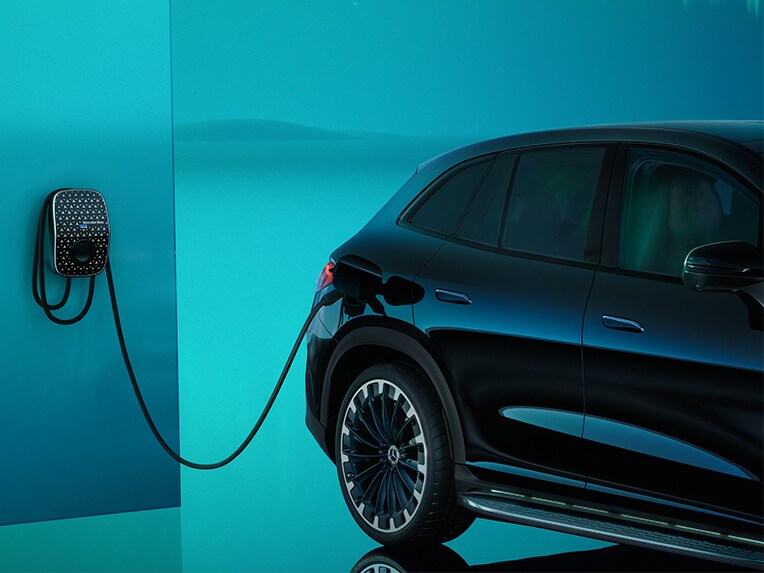 A Mercedes-Benz Wallbox on a garage wall.